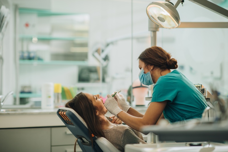 Routine dental checkup performed by a dental professional in a clinic in Mokena, IL